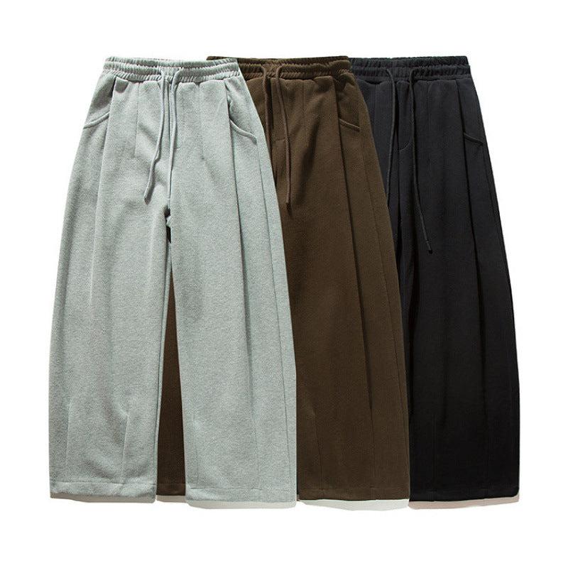 Unisex Wide Jogging Pants with Pleats, Elastic Drawstring and Side Pockets Mune Fashion