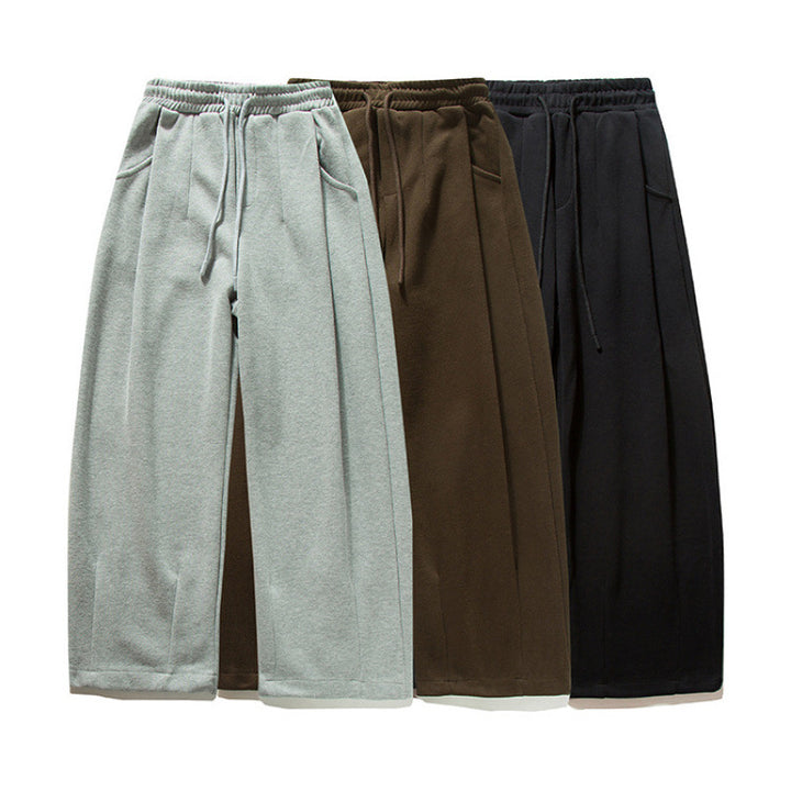 Unisex Wide Jogging Pants with Pleats, Elastic Drawstring and Side Pockets Mune Fashion