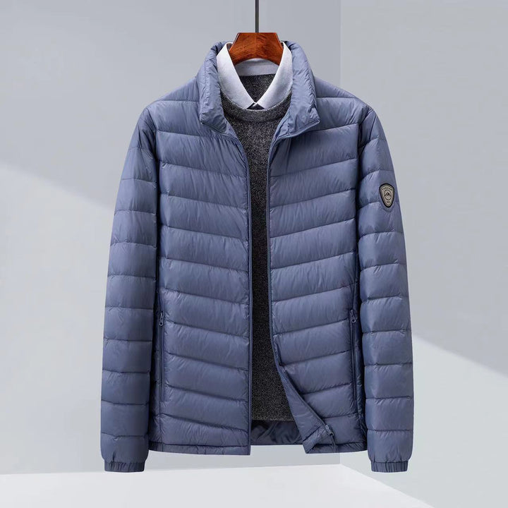 Men's quilted transition jacket with stand-up collar and zippered pockets Mune Fashion