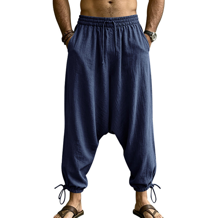 Men's harem pants with a low crotch, elastic waistband, and adjustable ankle cuffs Mune Fashion