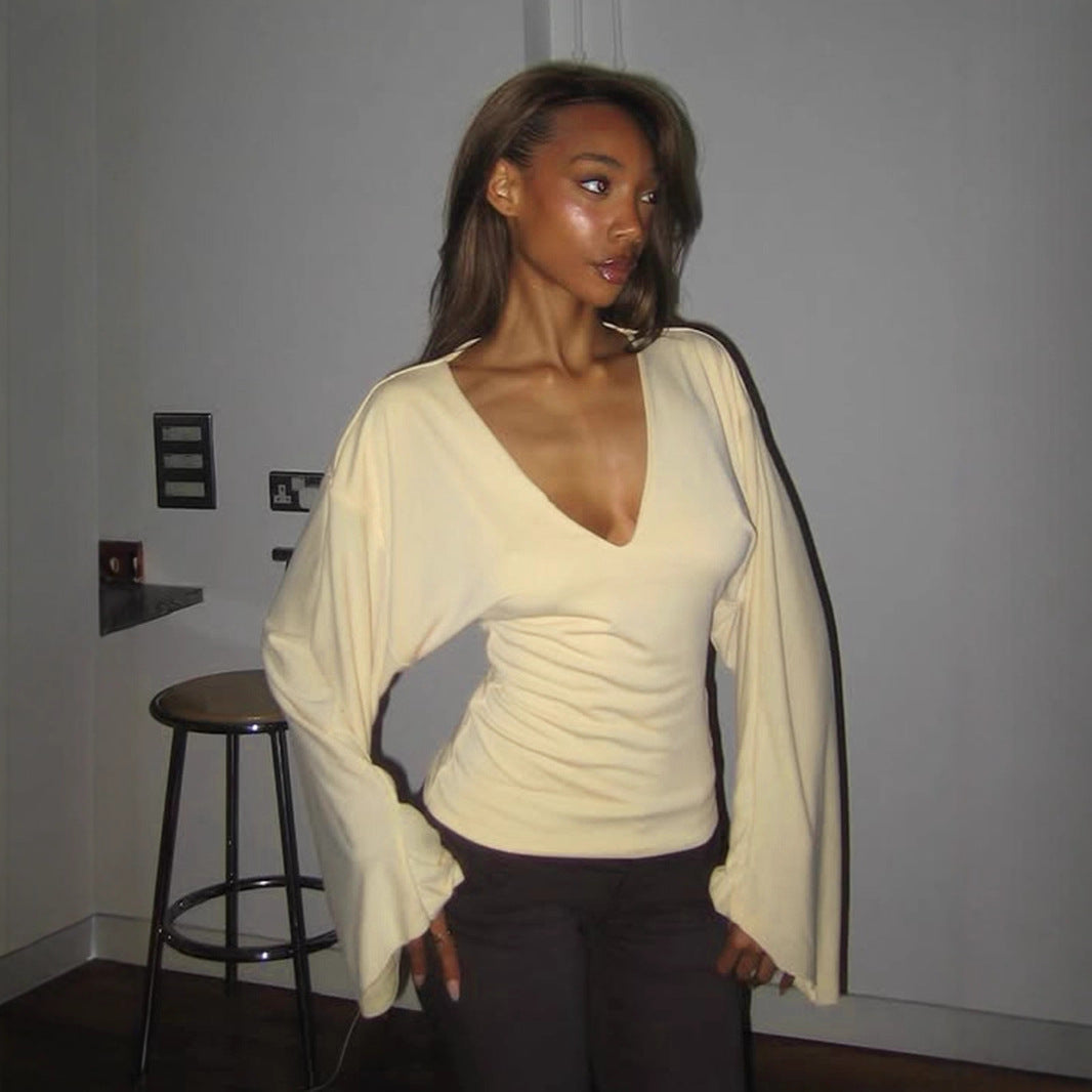 Women's tailored long sleeve cropped shirt with V-neck, dropped shoulder, and soft jersey quality Mune Fashion