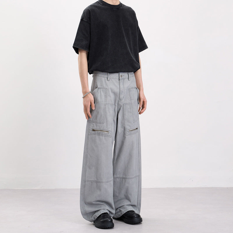 Men's baggy cargo pants in workwear style with large patch pockets and zipper details Mune Fashion