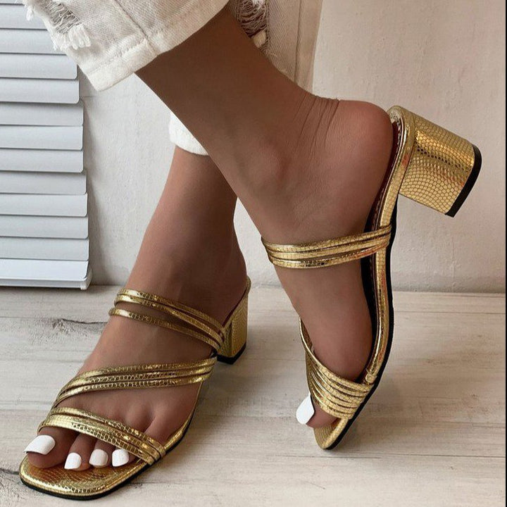 Ladies an elegant multi-strap mule with mid-high block heel and snake print Mune Fashion