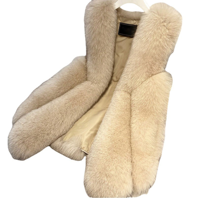 Ladies faux fur vest with long pile fur, waist-length A-line and padded inner finish Mune Fashion