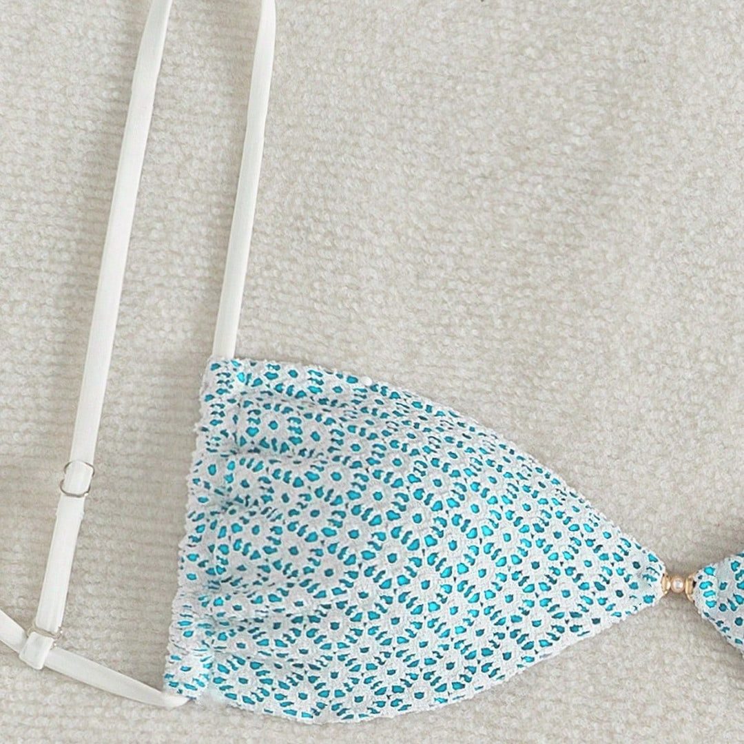 Ladies triangle bikini with playful flower print Mune Fashion
