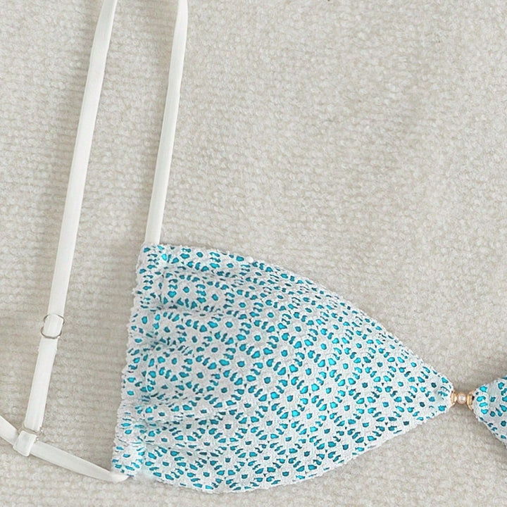 Ladies triangle bikini with playful flower print Mune Fashion