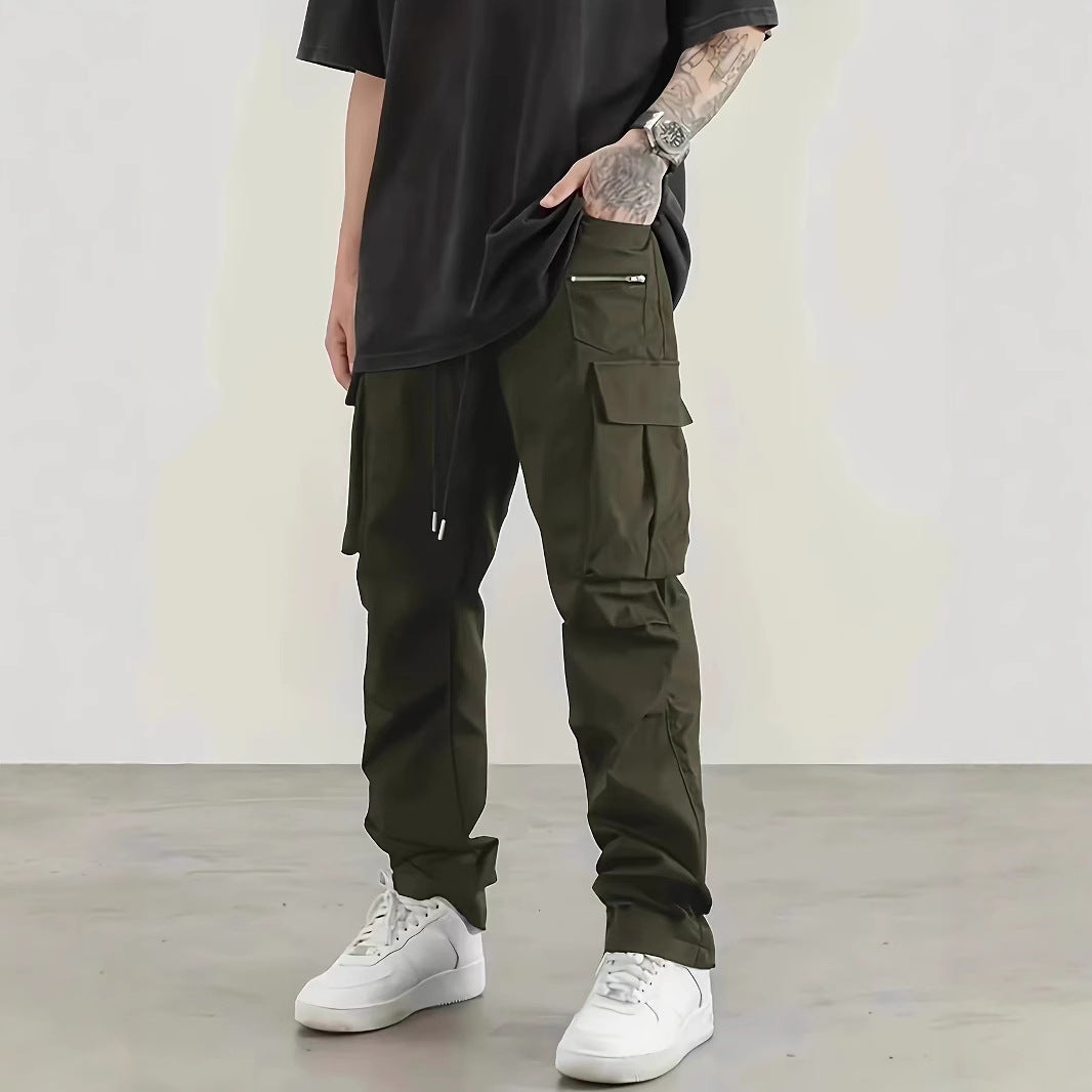 Men's wide technical cargo pants with large flap and zip pockets and drawstring waistband Mune Fashion
