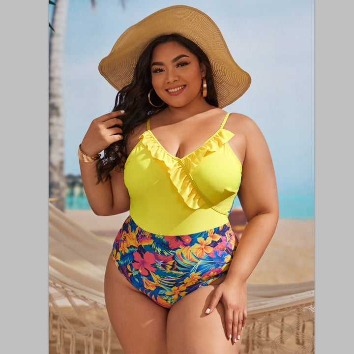 Women's one-piece swimsuit with asymmetrical ruffle design and floral pant area Mune Fashion