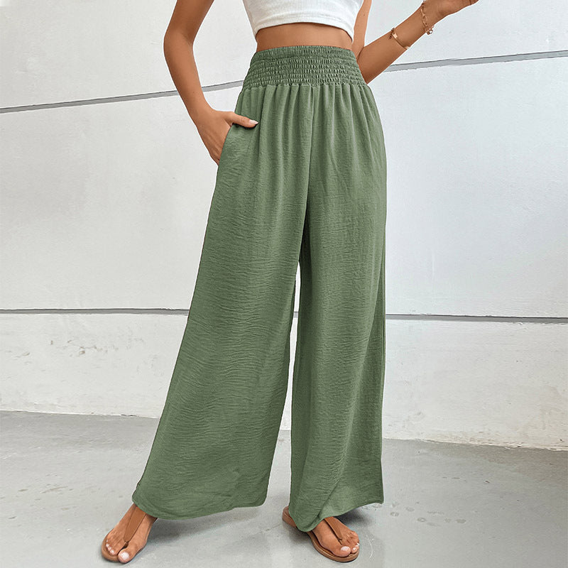 Women's palazzo pants with a high, elastic ruffled waistband and side pockets Mune Fashion