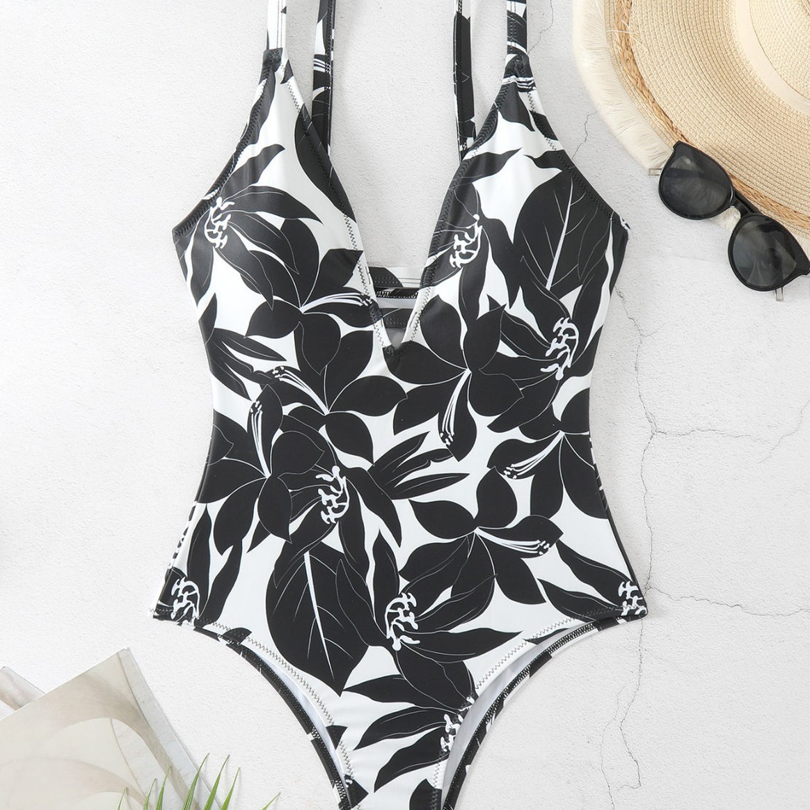 Women's one-piece bathing suit with elegant floral design and modern V-neck Mune Fashion