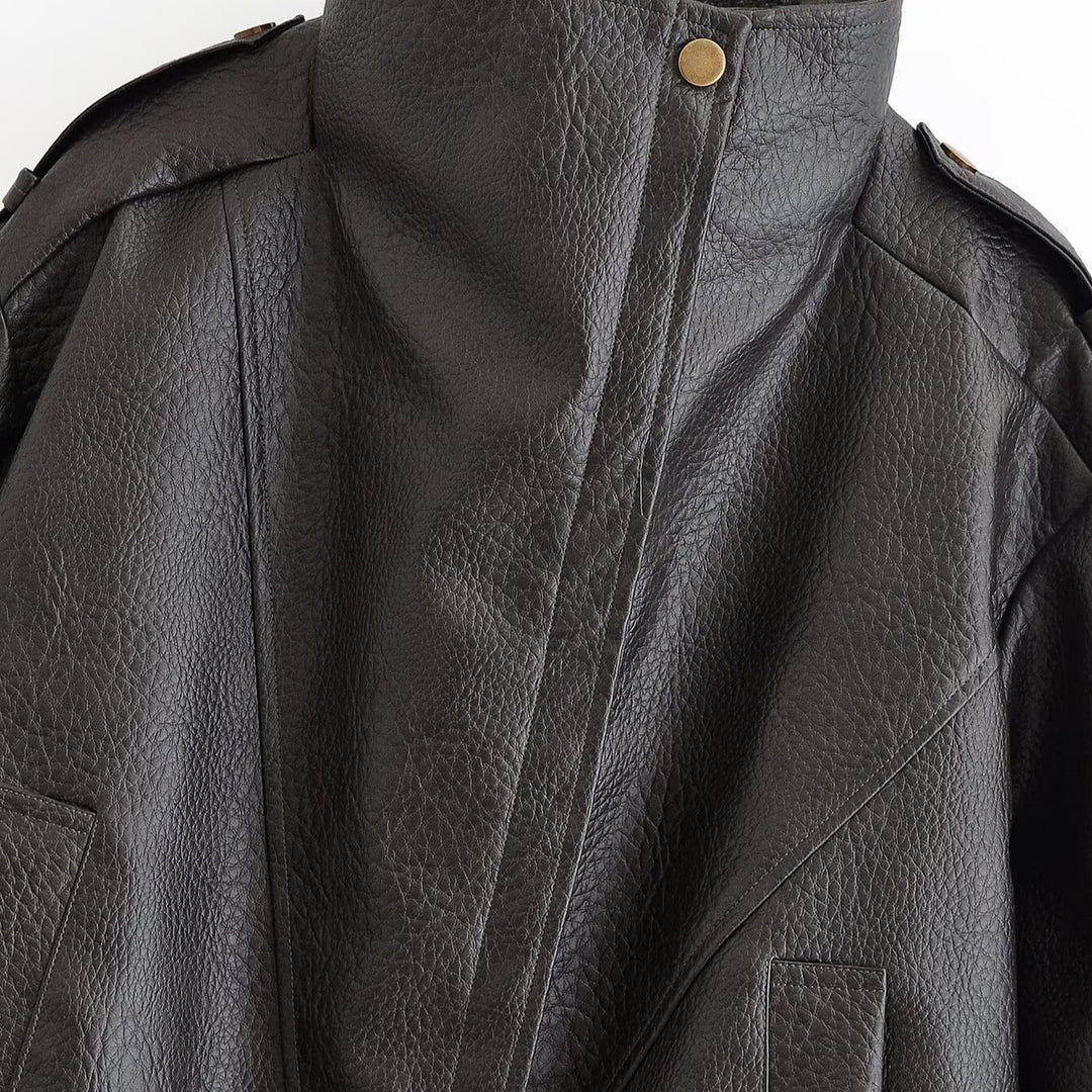Women’s short jacket in aviator style made of synthetic leather with high standing collar, shoulder straps, and fitted ribbed hem Mune Fashion