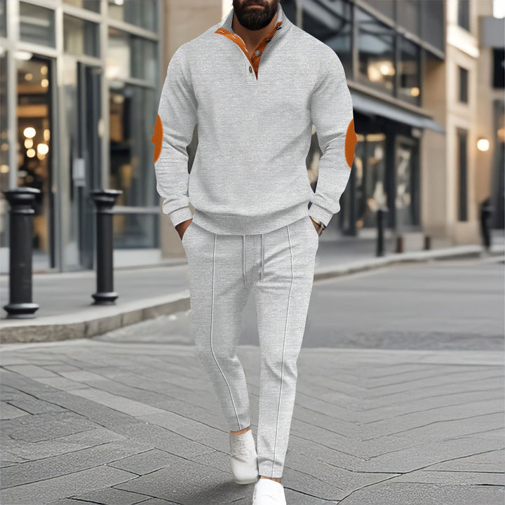 Men's fine-structured half-collar sweatshirt with button placket, decorative elbow patches, and casual hem finish Mune Fashion