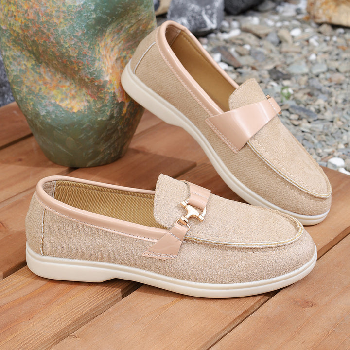 Ladies elegant suede slippers with decorative metal hardware and flexible easy-running sole Mune Fashion