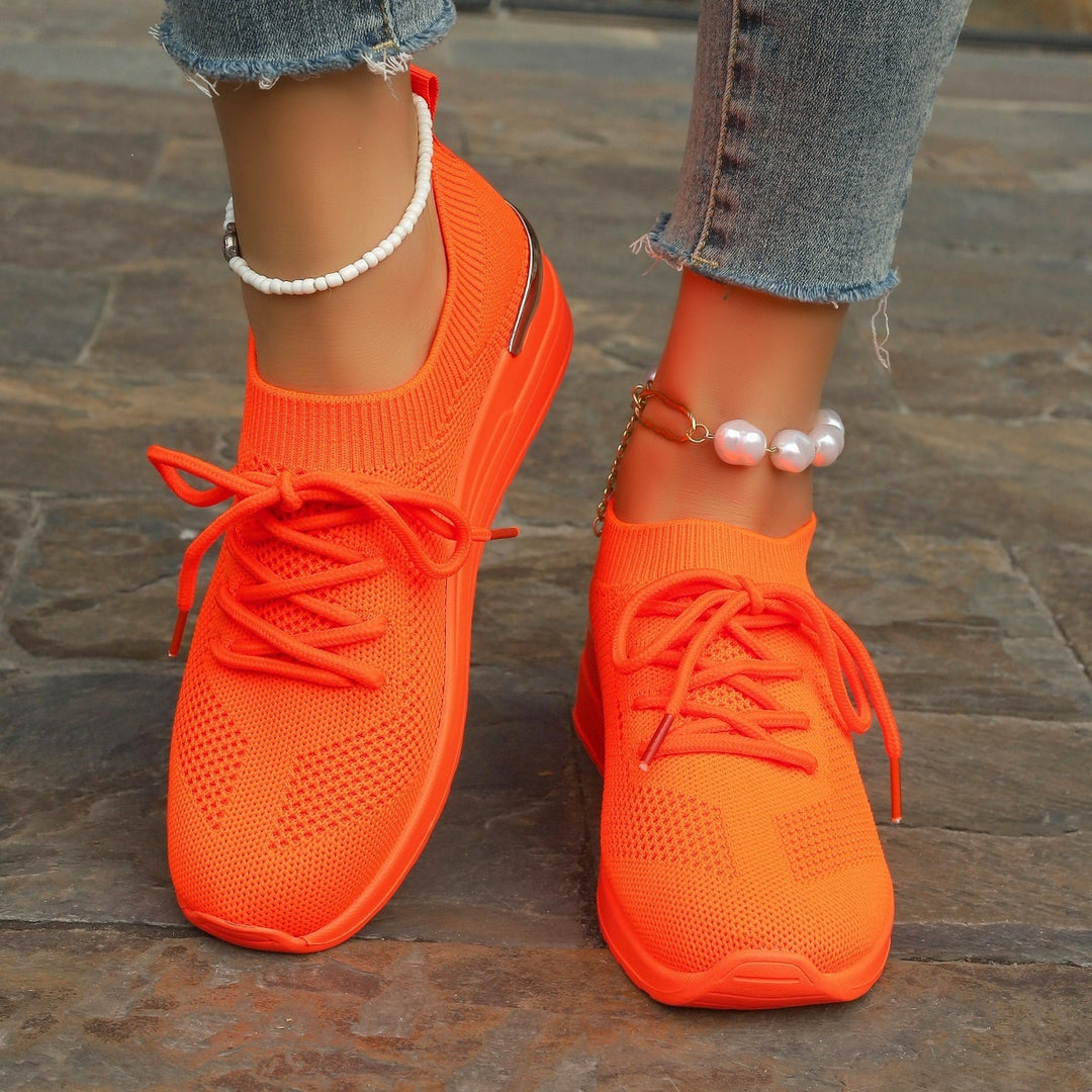 Women’s knit sneakers with wedge sole, sock-like shaft and metallic heel accent Mune Fashion