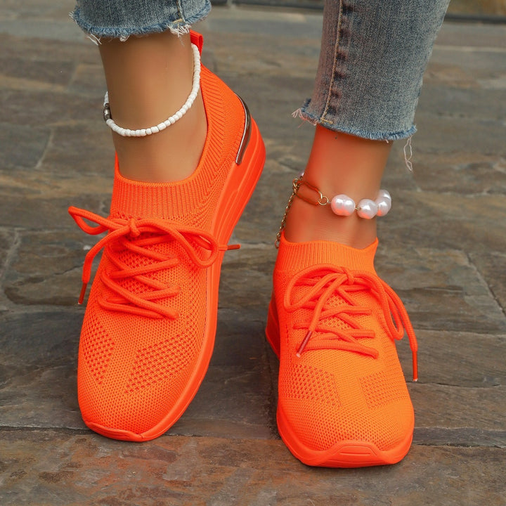 Women’s knit sneakers with wedge sole, sock-like shaft and metallic heel accent Mune Fashion