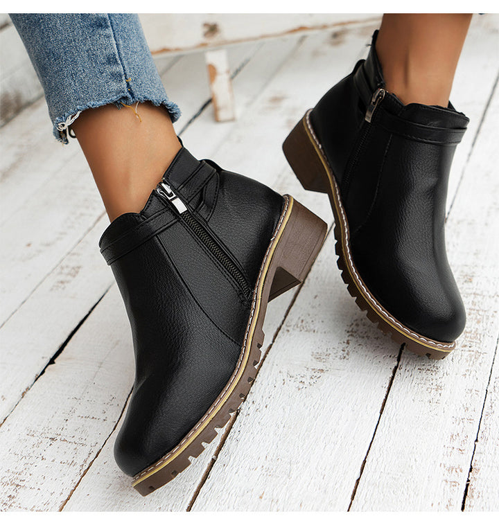 Women's ankle boot with double decorative straps, profiled tractor sole and low block heel Mune Fashion