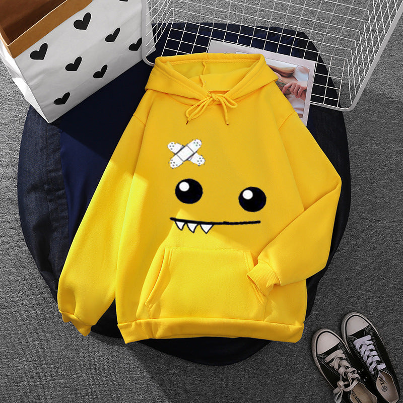 Women's hoodie with playful monster face, bandage application and kangaroo pocket Mune Fashion