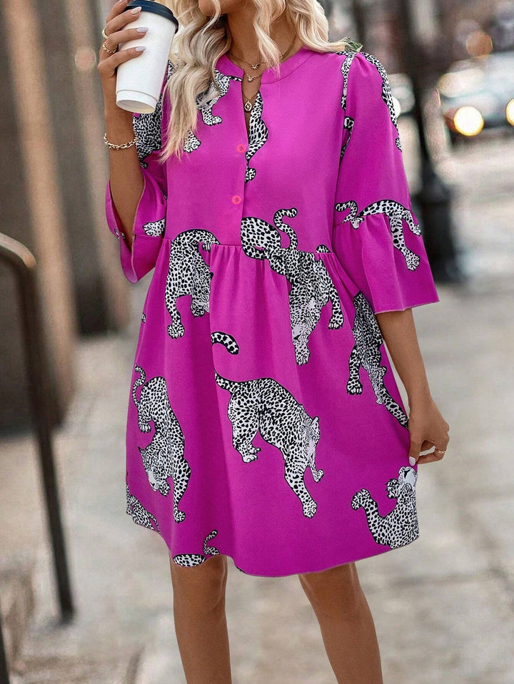 Women's casual tunic dress with gathered waist seam, button placket, and graphic animal silhouette print Mune Fashion