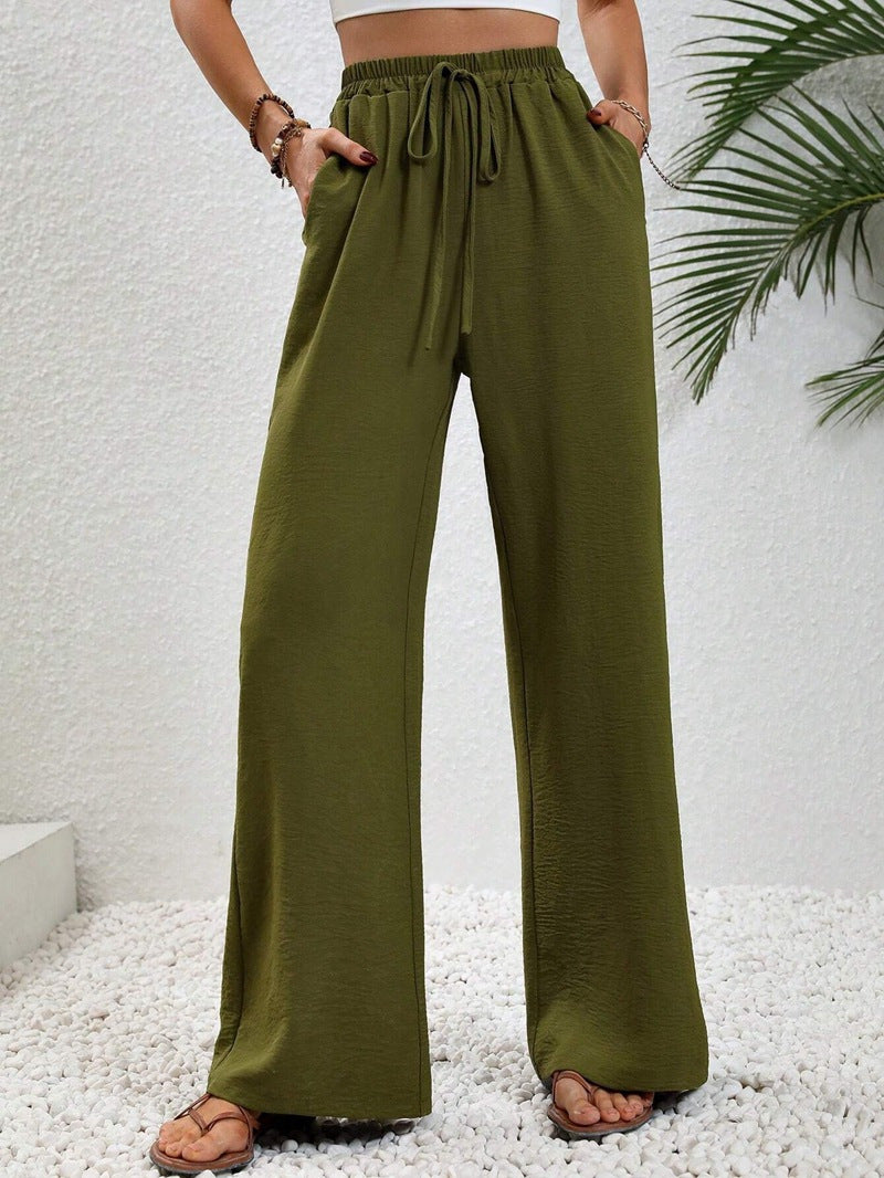 Ladies lightweight, loose-fitting beach pants with elastic waistband, drawstring and side pockets Mune Fashion