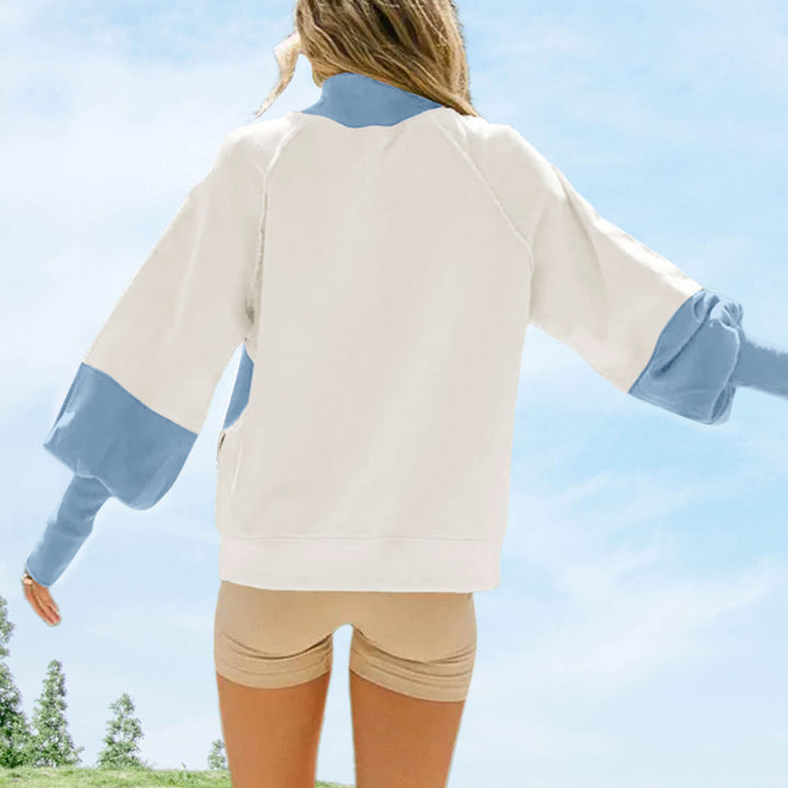 Women's casual oversized sweatshirt with high roll neck, raglan sleeves, and giraffe print Mune Fashion