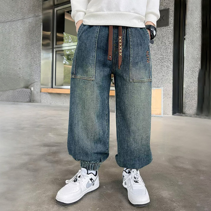 Unisex wide denim pants with elastic cuffs and large pockets Mune Fashion