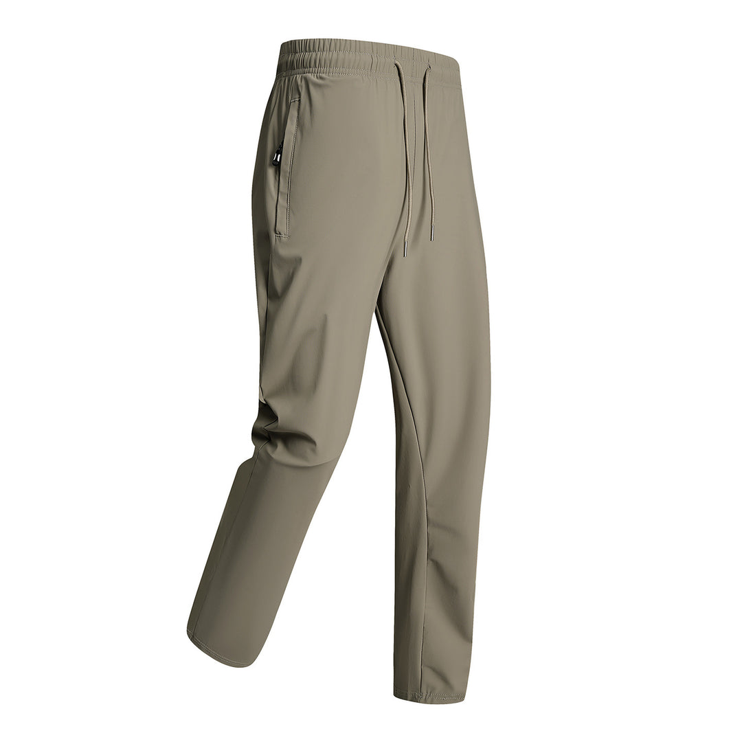 Men's sporty training pants with elastic waistband and zippered pockets Mune Fashion