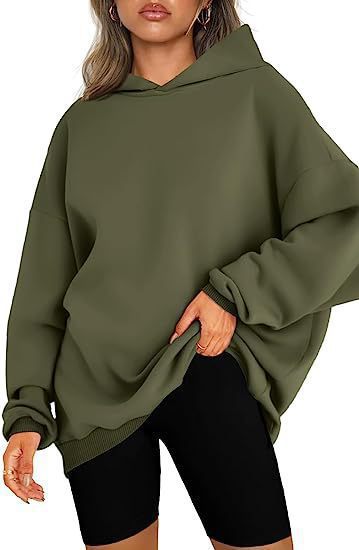 Women's oversized hoodie in longline cut with raglan sleeves and soft inner lining Mune Fashion