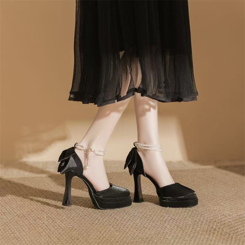 Ladies' satin platform pumps with decorative bow and adjustable ankle strap Mune Fashion
