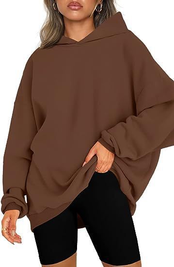 Women's oversized hoodie in longline cut with raglan sleeves and soft inner lining Mune Fashion