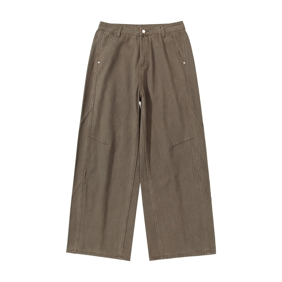 Women's wide pleated trousers in utility cargo style with high waist and prominent seam details Mune Fashion