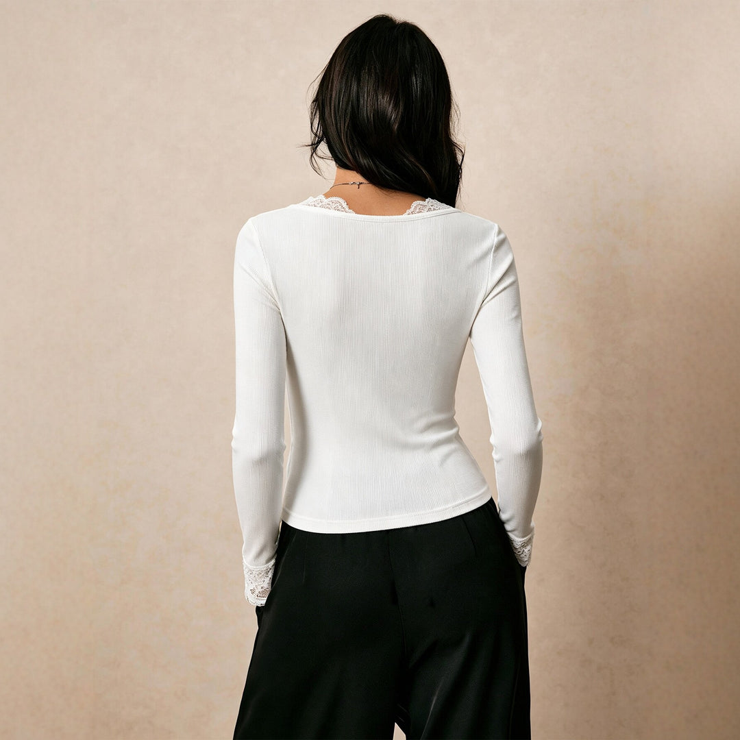 Women's fine ribbed long-sleeve shirt with lace V-neck, decorative bow and lace cuffs Mune Fashion