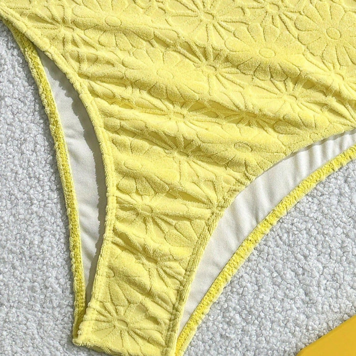 Women's swimsuit with playful ruffle design and trendy knot detail Mune Fashion