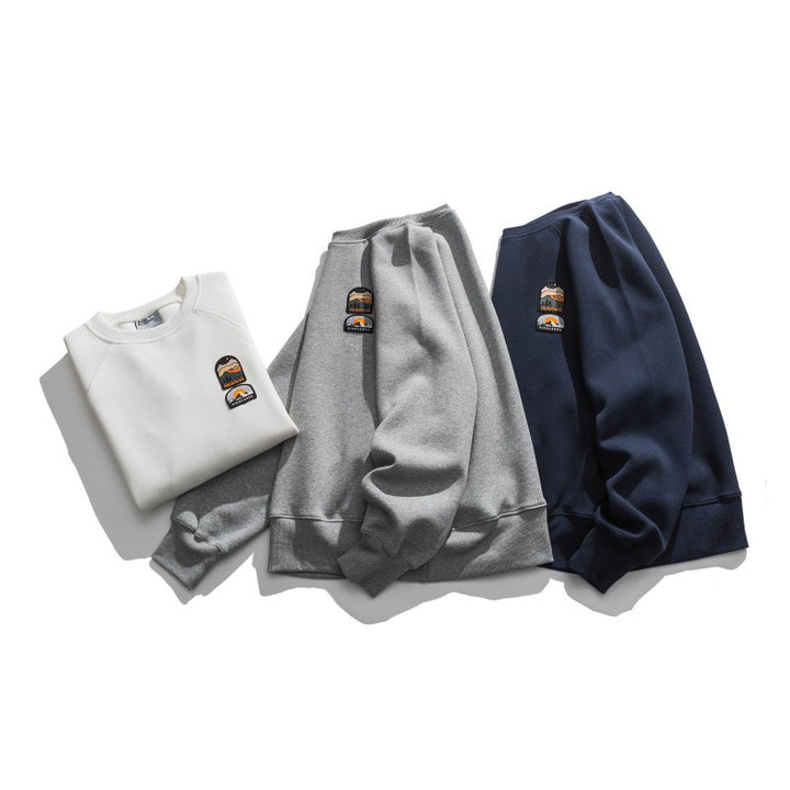 Unisex Oversize Sweatshirt with raglan sleeves and mountain patch Mune Fashion