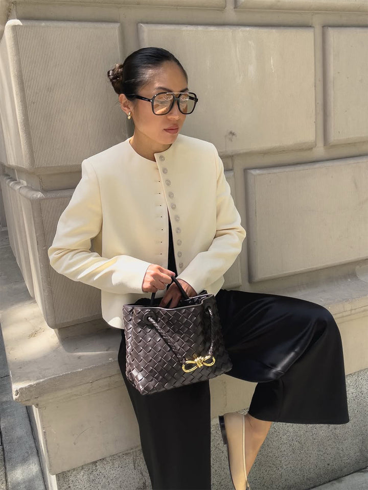 Women Elegant fitted short blazer with standing collar and decorative button placket Mune Fashion