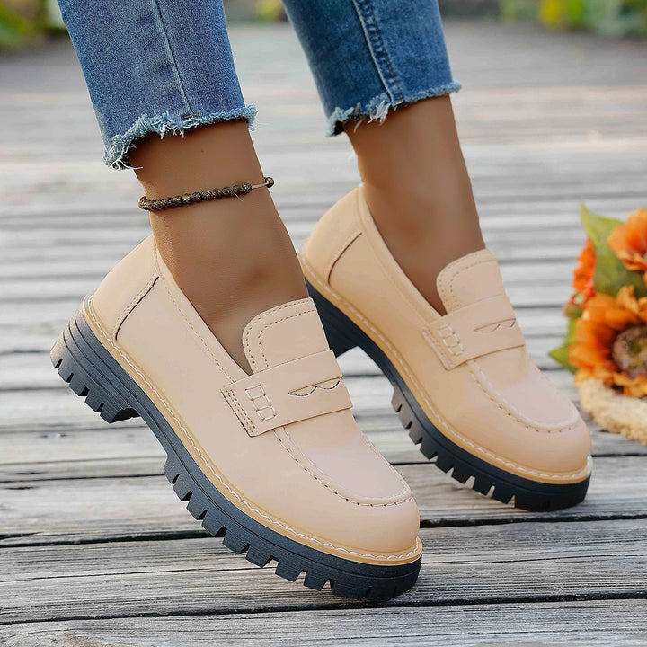 Men's robust penny loafers with distinctive profile sole, handcrafted decorative stitching, and padded comfort footbed Mune Fashion