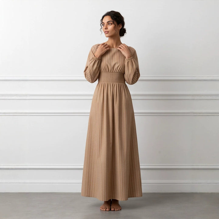 Women’s maxi dress with smocked waistband, square neckline, and long balloon sleeves Mune Fashion