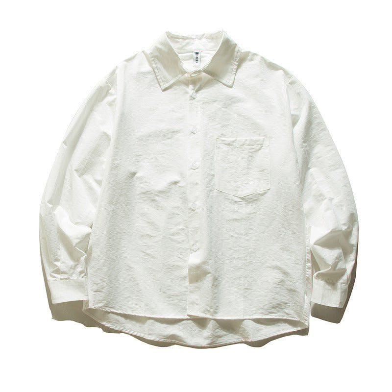 Unisex Oversize cotton shirt with boxy cut, breast pocket, and rounded hem Mune Fashion