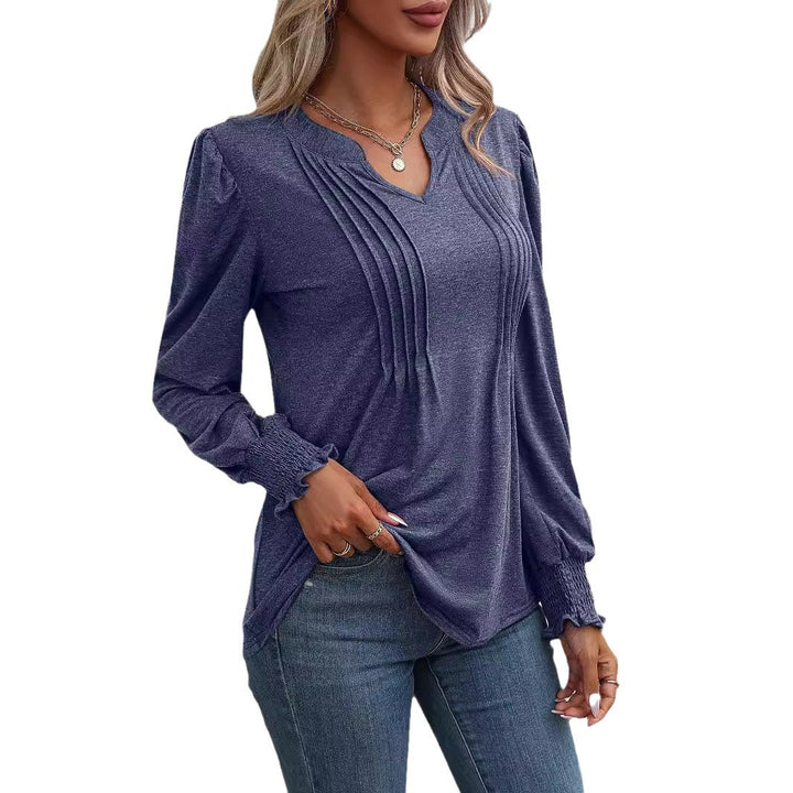 Women's long sleeve shirt with V-neckline, decorative inverted pleats at the front and elastic smocked cuffs Mune Fashion
