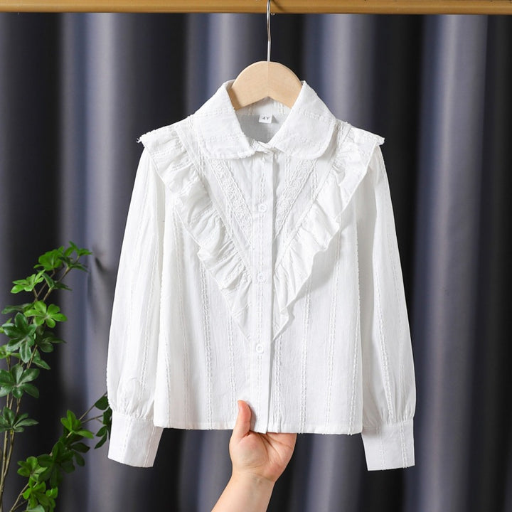 Women’s blouse with ruffle details and fine embroidery Mune Fashion