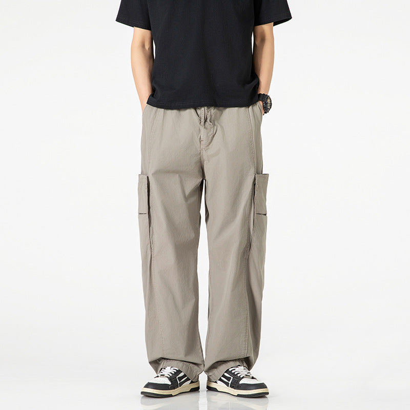 Men's Wide Nylon Cargo Pants in Utility Style with Side Flap Pockets Drune