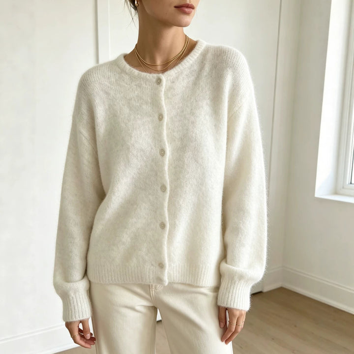 Ladies round neck cardigan with soft flormix, button closure and ribbed cuffs Mune Fashion
