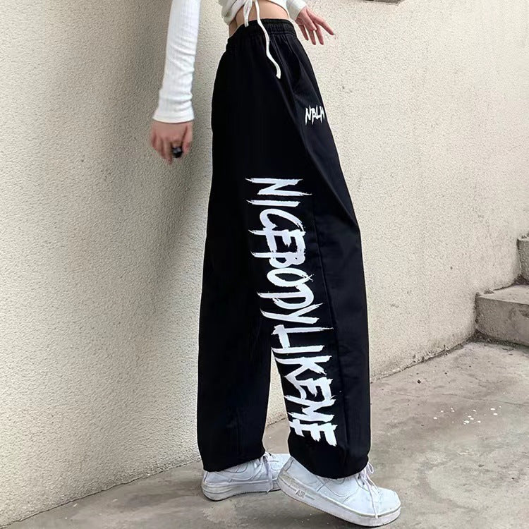 Women's high-waisted wide-leg jogging pants with a significant side print Mune Fashion