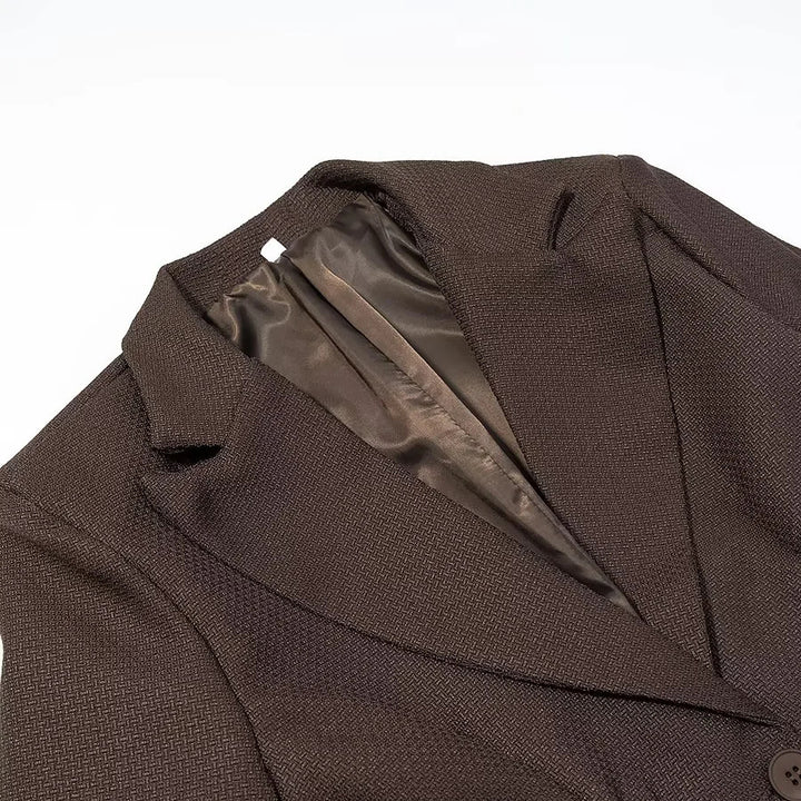 Women's tailored lapel blazer with elastic waist drawstring, single-breasted button placket, and quilted textured fabric Mune Fashion