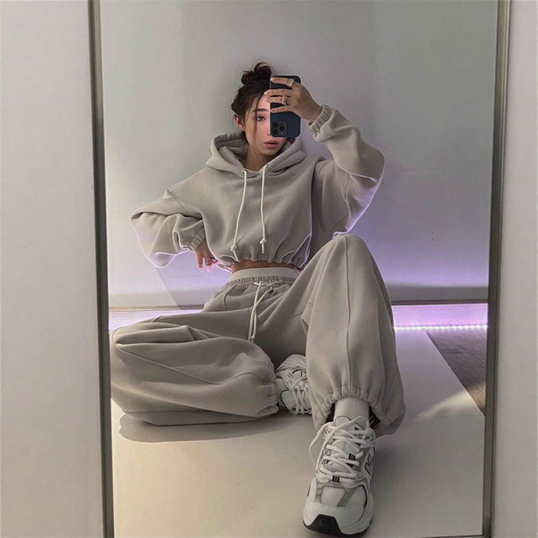 Women's oversized hoodie and jogger set with soft inner lining, adjustable drawstring, and raised waistband.