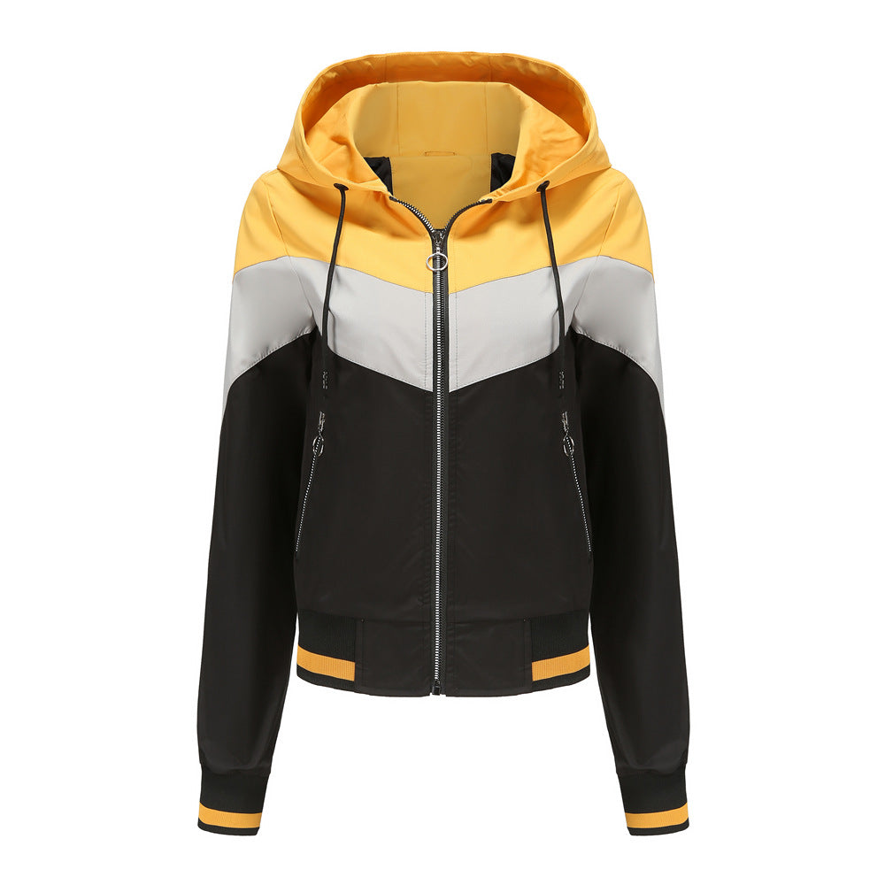 Women's lightweight windbreaker jacket with hood, block panel design, zippered pockets, and elastic hem Mune Fashion