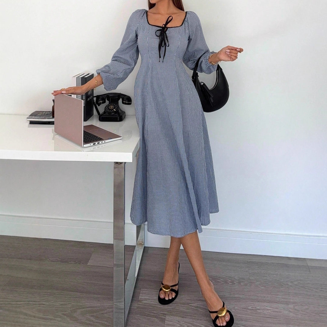 Ladies maxi dress with gingham check, square neckline, waist gathering and balloon sleeves Mune Fashion