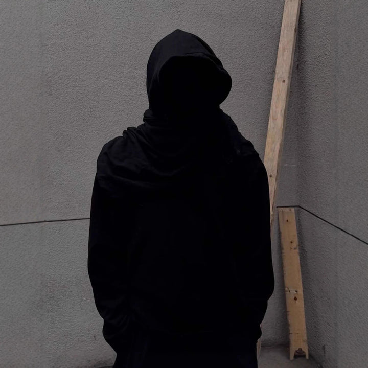 Unisex hooded pullover in usage marks style with attached tube scarf and frayed openings Mune Fashion