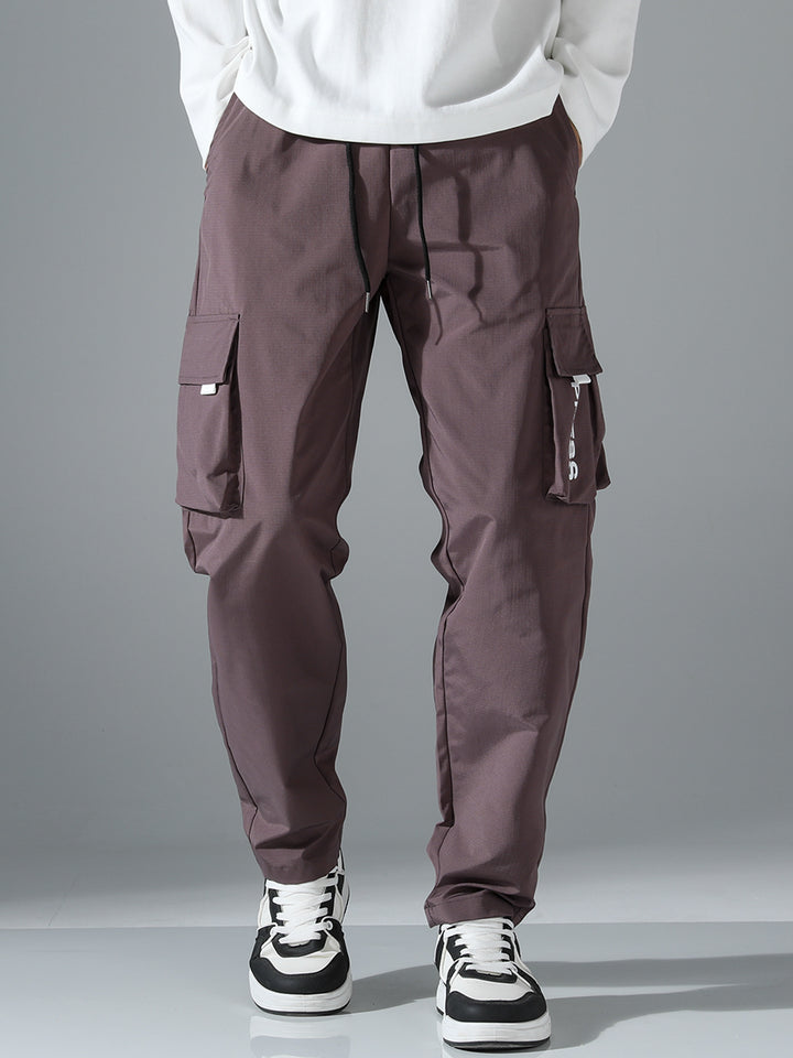 Men's cargo joggers with elastic waistband, side flap & zipper pockets Mune Fashion