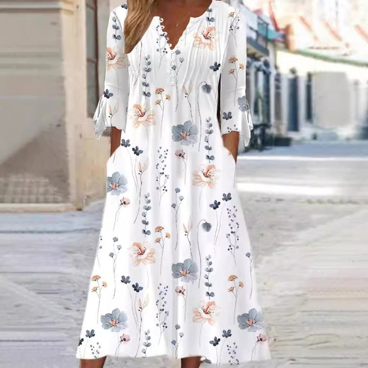Women's flowing maxi dress with V-neck, chest yoke, ruffled sleeves and pockets Mune Fashion