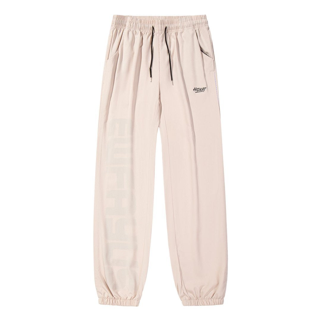 Men's sporty training pants with elastic waistband and side zip pockets Mune Fashion